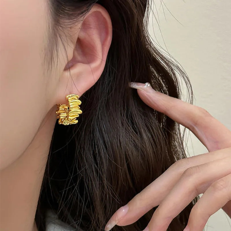 Boucles d’Oreilles Ondulées
