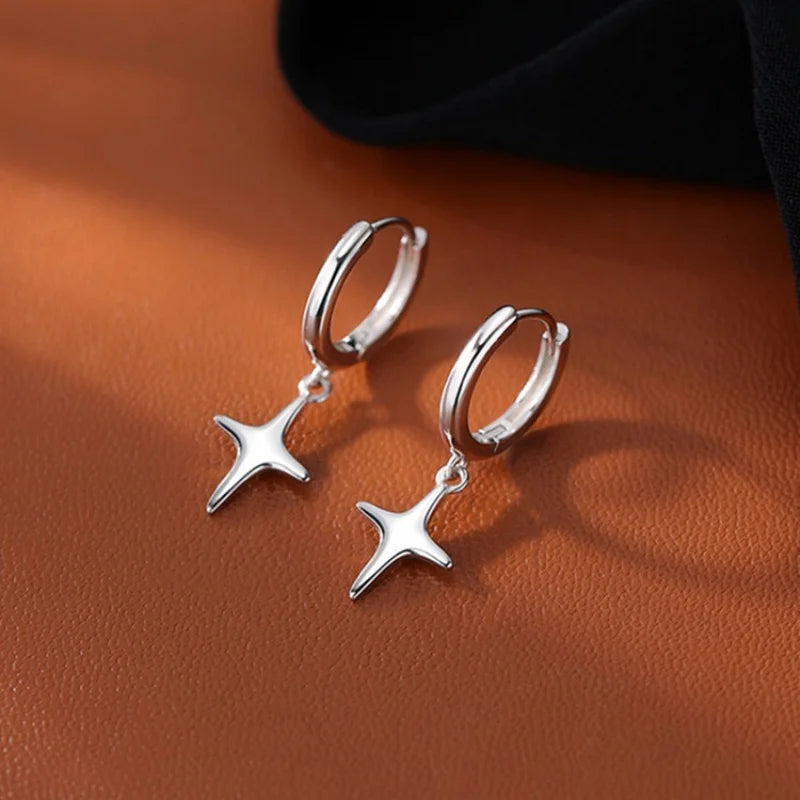 Boucles d’Oreilles Rondes à Etoile en Argent Design